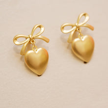 Load image into Gallery viewer, Matte Gold Plated Ribbon Heart Earrings